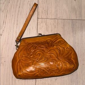Patricia Nash Brown Floral Embossed Wristlet Savena with a kiss lock closure